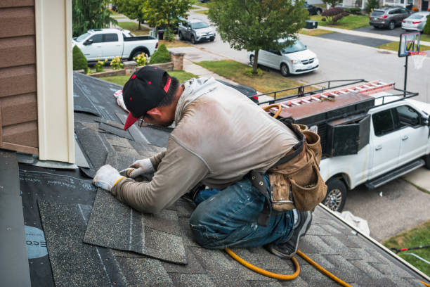 Professional Roofing technician working in Lynn, IN